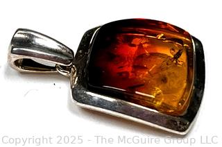 Polished Amber in Sterling Silver Surround Pendant.