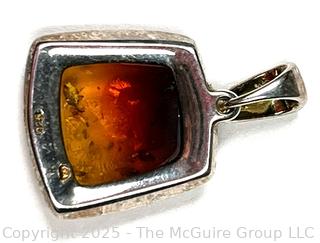 Polished Amber in Sterling Silver Surround Pendant.
