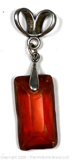 Hand Carved Amber Stone Pendant on Silver Bale. 