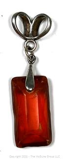 Hand Carved Amber Stone Pendant on Silver Bale. 