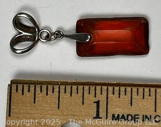 Hand Carved Amber Stone Pendant on Silver Bale. 