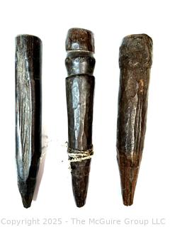 Three (3) Carved Wood African Weaving Pegs