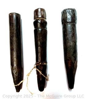 Three (3) Carved Wood African Weaving Pegs