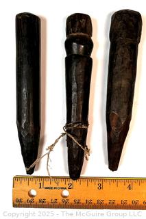 Three (3) Carved Wood African Weaving Pegs