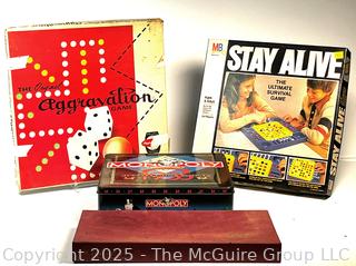 Four (4) Board Games Including Stay Alive, Aggravation, Monopoly and Scrabble