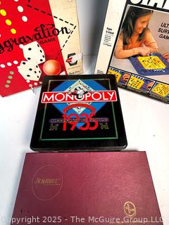 Four (4) Board Games Including Stay Alive, Aggravation, Monopoly and Scrabble
