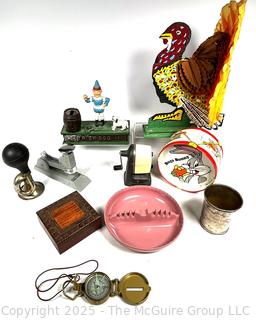 Compass, Horn, Decorations, Stapler, Pencil Sharpener, Cast Iron Bank, Trinket Box. 
