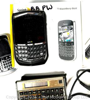 SuperSonic 4 Band Radio, Blackberry Bold, NuvoMed Sterilizer Box, Pocket Calculator and Phone