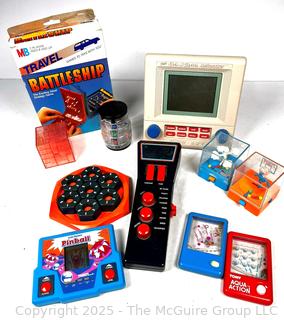 Hand-Held Games Including Puzzles, Sound Gizmo, The Etch A Sketch Animator, Travel Battleship, TOMY and Electronic Pinball, Untested