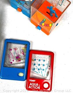Hand-Held Games Including Puzzles, Sound Gizmo, The Etch A Sketch Animator, Travel Battleship, TOMY and Electronic Pinball, Untested