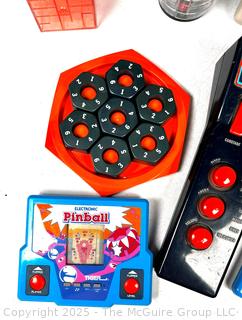 Hand-Held Games Including Puzzles, Sound Gizmo, The Etch A Sketch Animator, Travel Battleship, TOMY and Electronic Pinball, Untested