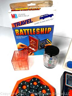 Hand-Held Games Including Puzzles, Sound Gizmo, The Etch A Sketch Animator, Travel Battleship, TOMY and Electronic Pinball, Untested