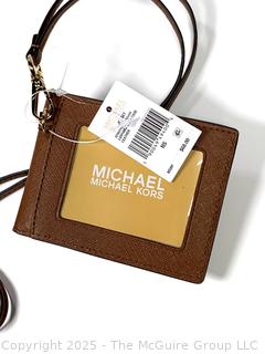 Two (2) Michael Kors Handbags Including Center Striped Wallet and Lanyard Case New with Tags