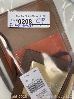 Two (2) Michael Kors Handbags Including Center Striped Wallet and Lanyard Case New with Tags