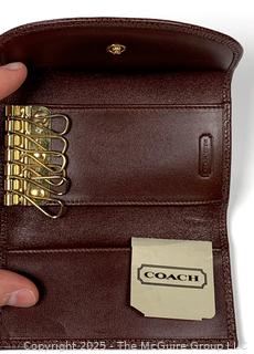 Three (3) Coach Handbags Including Key Fob Case and Signature Lanyard Card Case All New with Tags