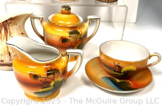 Collection of Hand-Painted Porcelain Vases and Tea Service