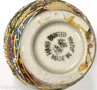 Collection of Hand-Painted Porcelain Vases and Tea Service