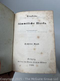Two (2) Leather with Marbled Boards German Script Books, 1839