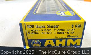 Six (6) HO Scale Train Cars in Original Boxes Including  TYCO, AHM and COX 