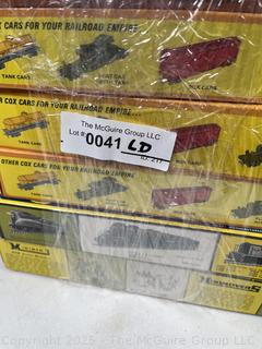 Six (6) HO Scale Train Cars in Original Boxes Including  TYCO, AHM and COX 