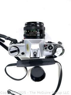 Canon AE-1 35mm Film Camera With a Canon FD 50mm 1:1.8 Lens