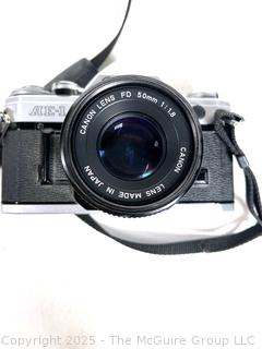 Canon AE-1 35mm Film Camera With a Canon FD 50mm 1:1.8 Lens