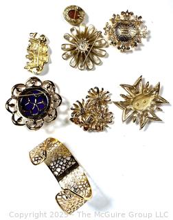 Seven (7) Costume Jewelry Brooches and Cuff Bracelet