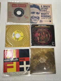 Fourteen (14) 45rpm Records