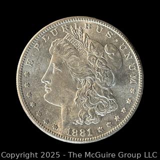 1881 (S) US One Dollar Morgan Head Silver coin (some luster)