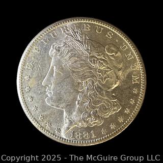 1881 (S) US One Dollar Morgan Head Silver coin (some luster)