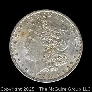 1881 (O) US One Dollar Morgan Head Silver coin (some luster)