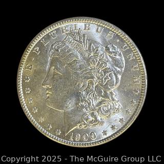 1900 (O) US One Dollar Morgan Head Silver Coin (some luster)