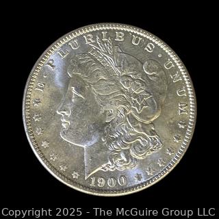 1900 (O) US One Dollar Morgan Head Silver Coin (some luster)
