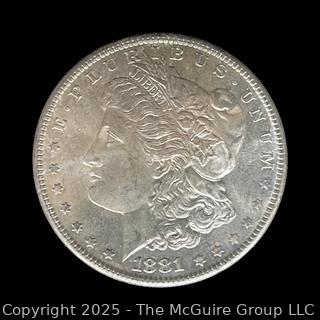 1881 (S) US One Dollar Morgan Head Silver coin (some luster)