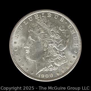 1900 (O) US One Dollar Morgan Head Silver Coin (some luster)