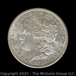 1881 (S) US One Dollar Morgan Head Silver coin (some luster)