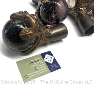 Set of Four (4) Cast Iron Northwind Face Eagle Talon Glass Ball Table Feet