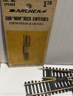 H-O Scale Model Toy Train Tracks and Switch Assortment