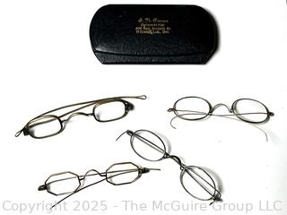 Four Pairs of Wire Framed Spectacles with Case