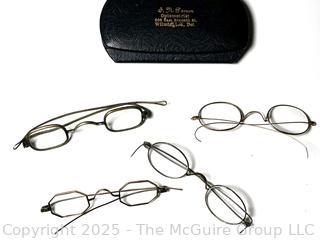 Four Pairs of Wire Framed Spectacles with Case