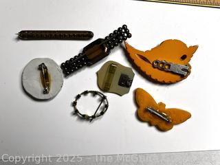 Seven (7) Pieces of Vintage Brooches Including Bakelite