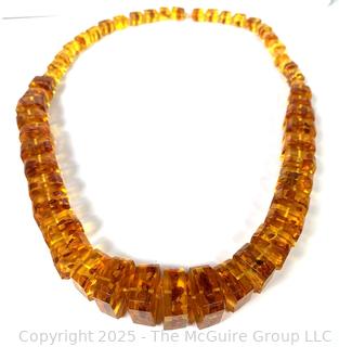 Graduated Cube Cut Honey Amber Colored Bead Necklace.