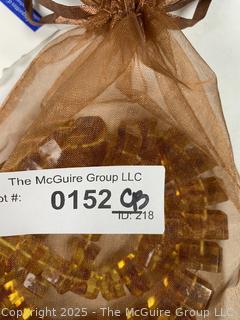 Graduated Cube Cut Honey Amber Colored Bead Necklace.