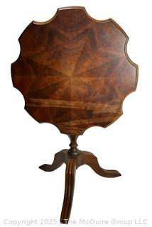 Tilt Top Pedestal Table by Kiel Furniture Company.