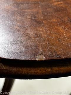 Tilt Top Pedestal Table by Kiel Furniture Company.