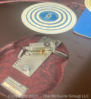 Rotoboard, A Drafting Tool Designed for "Drawing in the Round"; and a "Gerber Variable Scale, a Mechanical Computational Device Used by Engineers and Architects for Graphical Applications.  