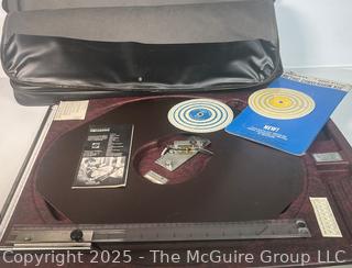 Rotoboard, A Drafting Tool Designed for "Drawing in the Round"; and a "Gerber Variable Scale, a Mechanical Computational Device Used by Engineers and Architects for Graphical Applications.  