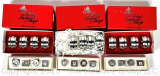 Three (3) Boxes of Shirley Pewter Shops Napkin Holders and Three (3) Boxes Pottery Barn Placard Holders