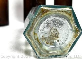 Four (4) Antique Bottles from Privy Dig