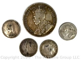 British Silver Coins with Various Dates and Denominations
